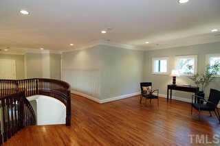 3324 Thomas Road Raleigh, NC 27607 - Photo 9 of 12 a view of a room with furniture and wooden floor