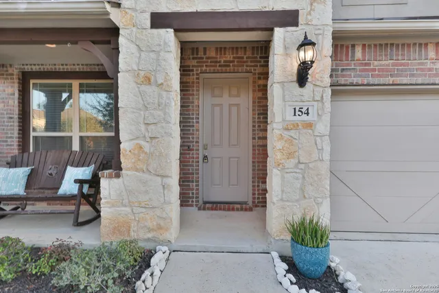 a entryway with a bench in patio
