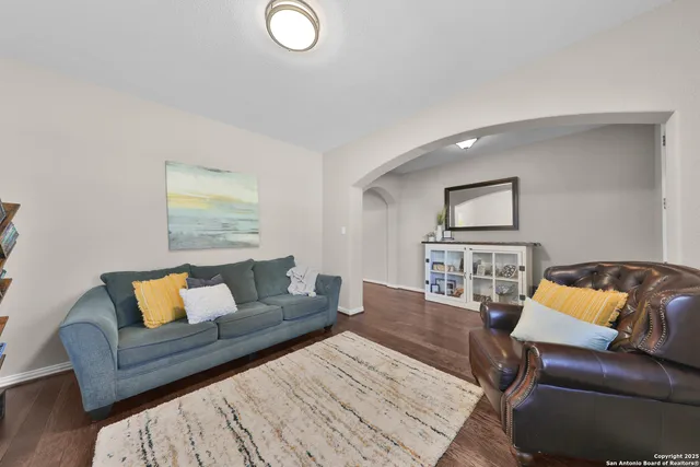 a living room with furniture and a couch