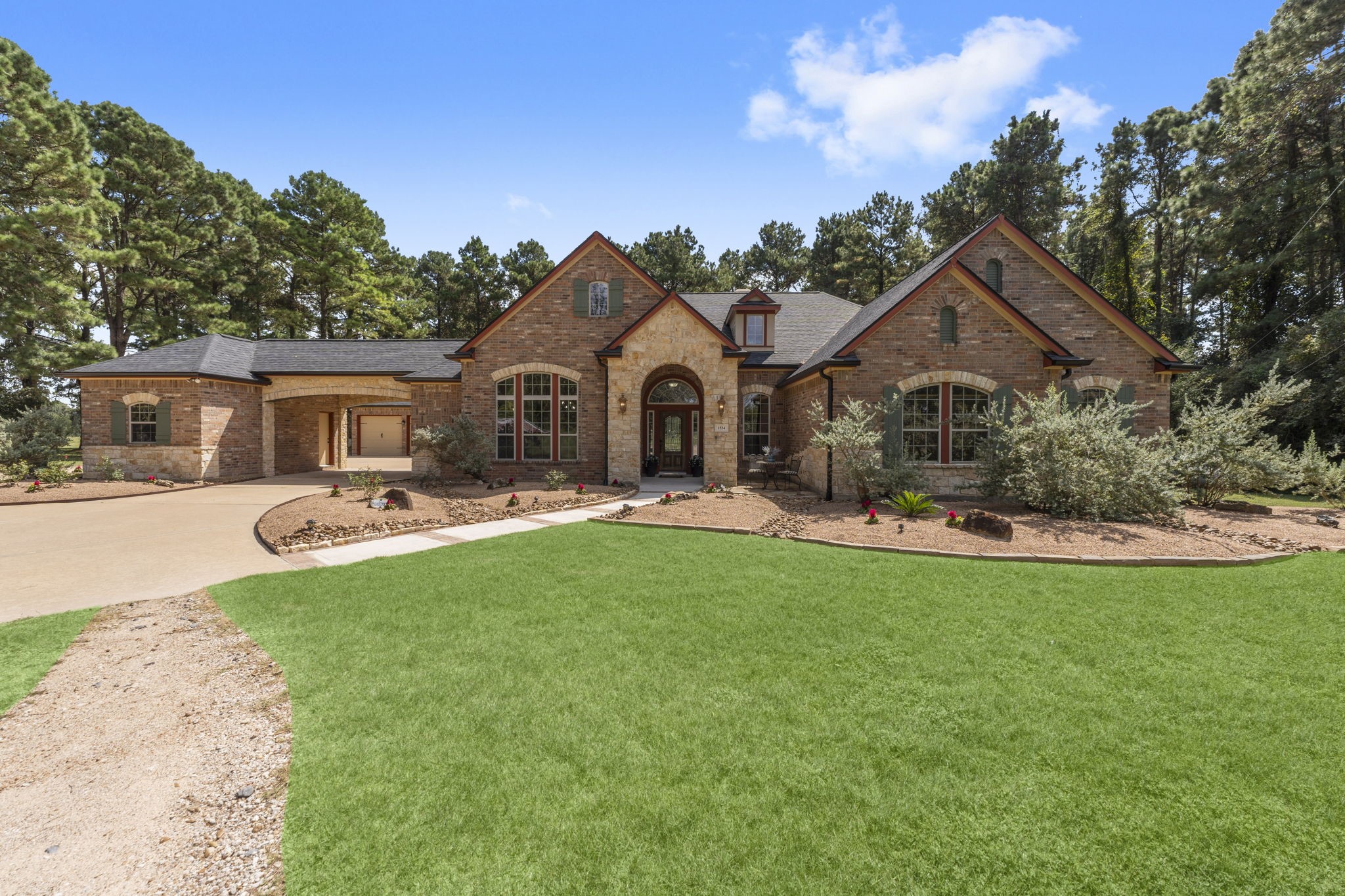 1534 Virgie Community Road Magnolia, TX 77354 - Photo 3 of 50 The beautiful curb appeal on this home makes you want to walk immediately inside! This home has so much to offer for so many families!