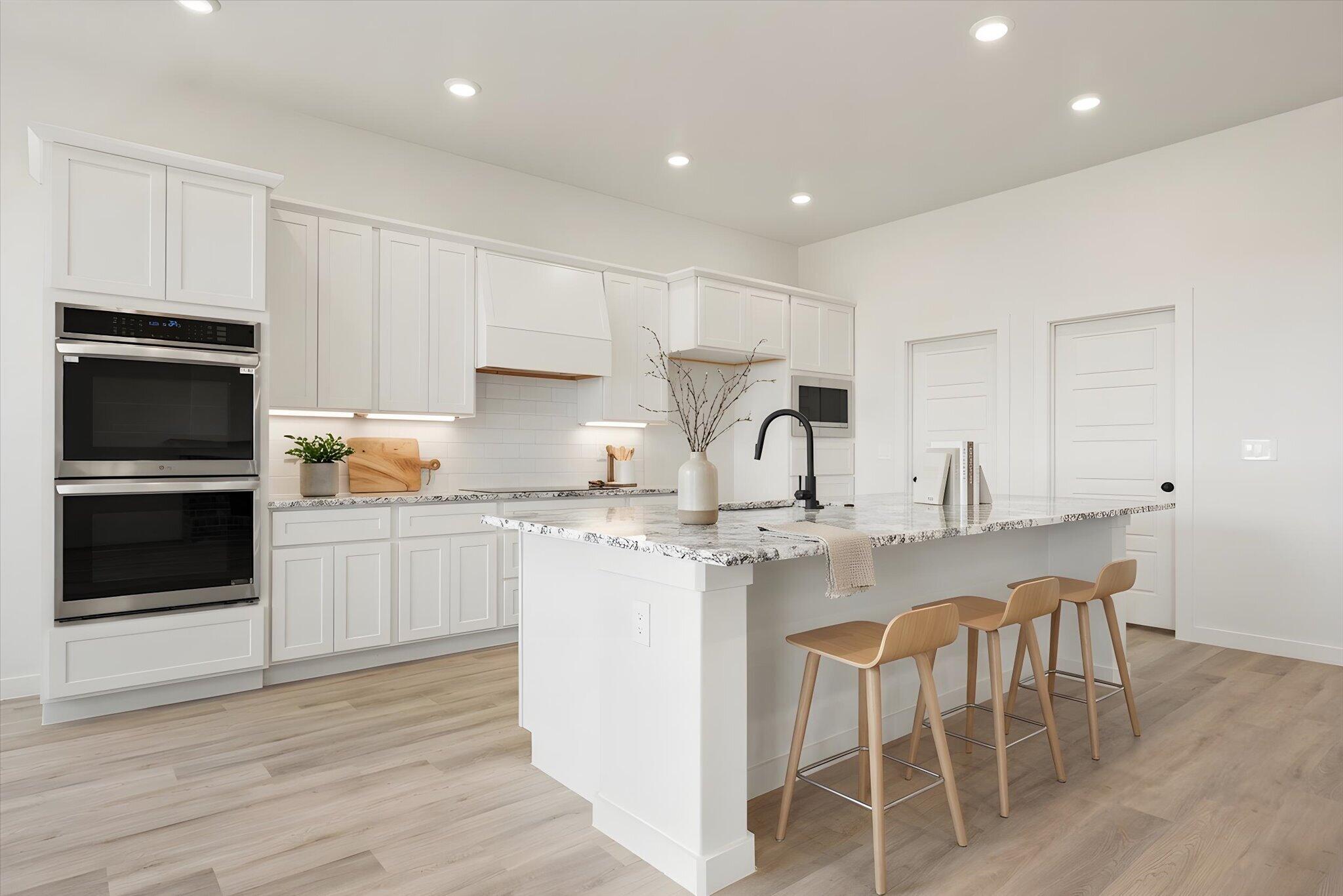 6103 121st Street Lubbock, TX 79424 - Photo 11 of 30 a kitchen with a sink and chairs