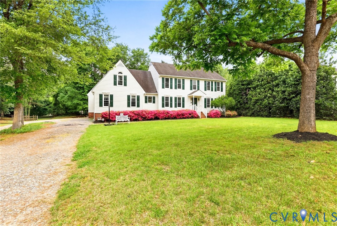 12111 Auger Lane Midlothian, VA 23113 - Photo 1 of 31 a front view of house with yard and green space