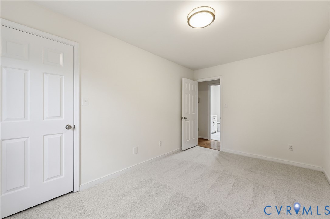 12111 Auger Lane Midlothian, VA 23113 - Photo 18 of 31 a view of an empty room