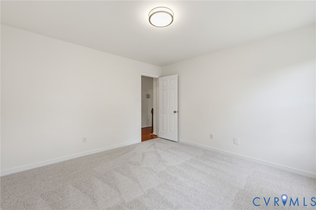 12111 Auger Lane Midlothian, VA 23113 - Photo 20 of 31 a view of an empty room