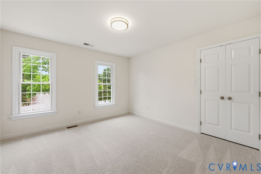 12111 Auger Lane Midlothian, VA 23113 - Photo 21 of 31 a view of an empty room with a window