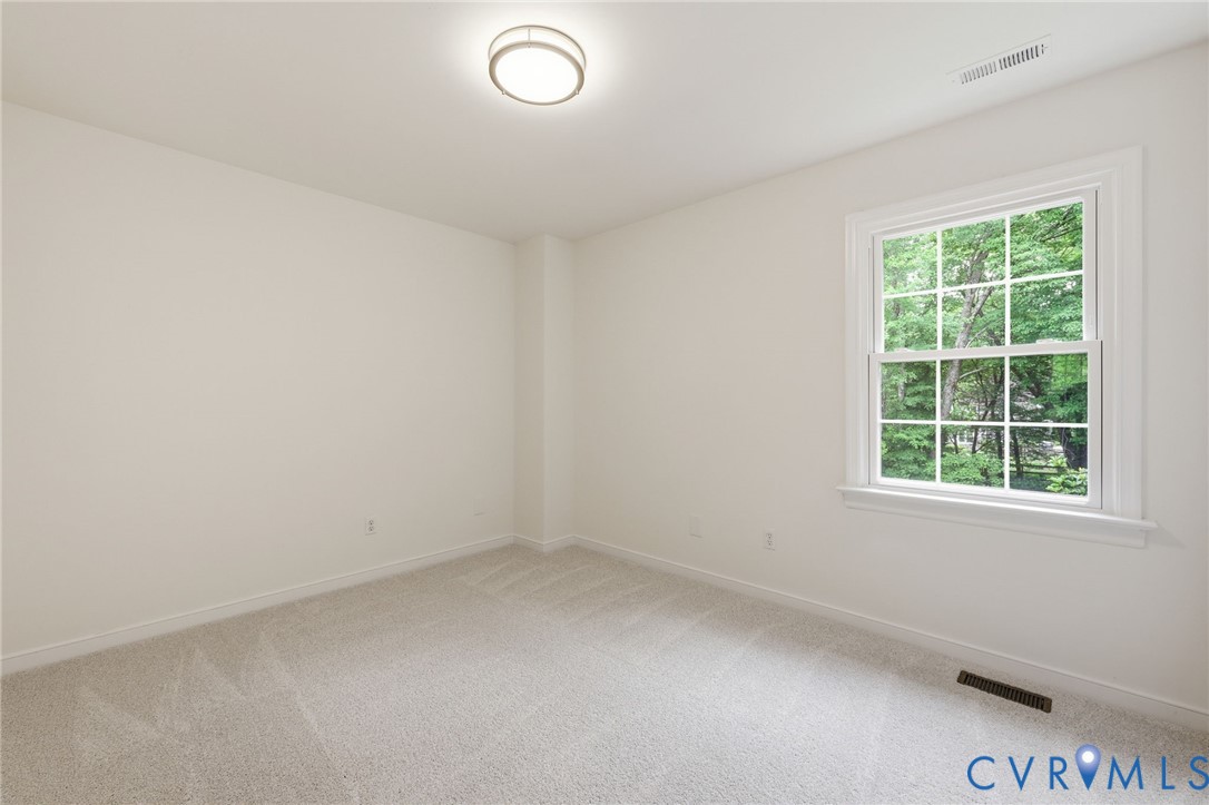 12111 Auger Lane Midlothian, VA 23113 - Photo 23 of 31 an empty room with a window