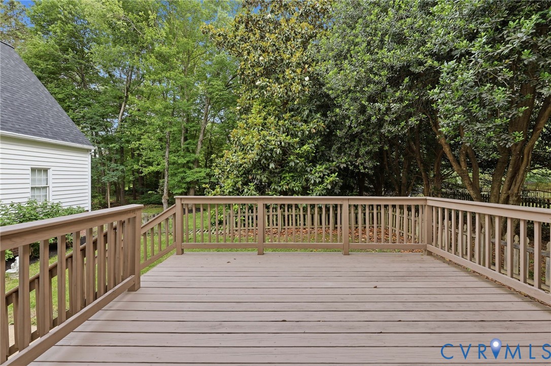 12111 Auger Lane Midlothian, VA 23113 - Photo 30 of 31 a view of balcony with wooden floor and fence