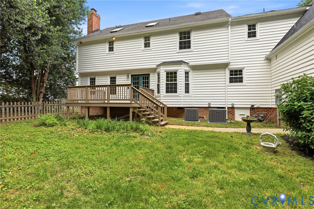 12111 Auger Lane Midlothian, VA 23113 - Photo 3 of 31 a house view with a garden space