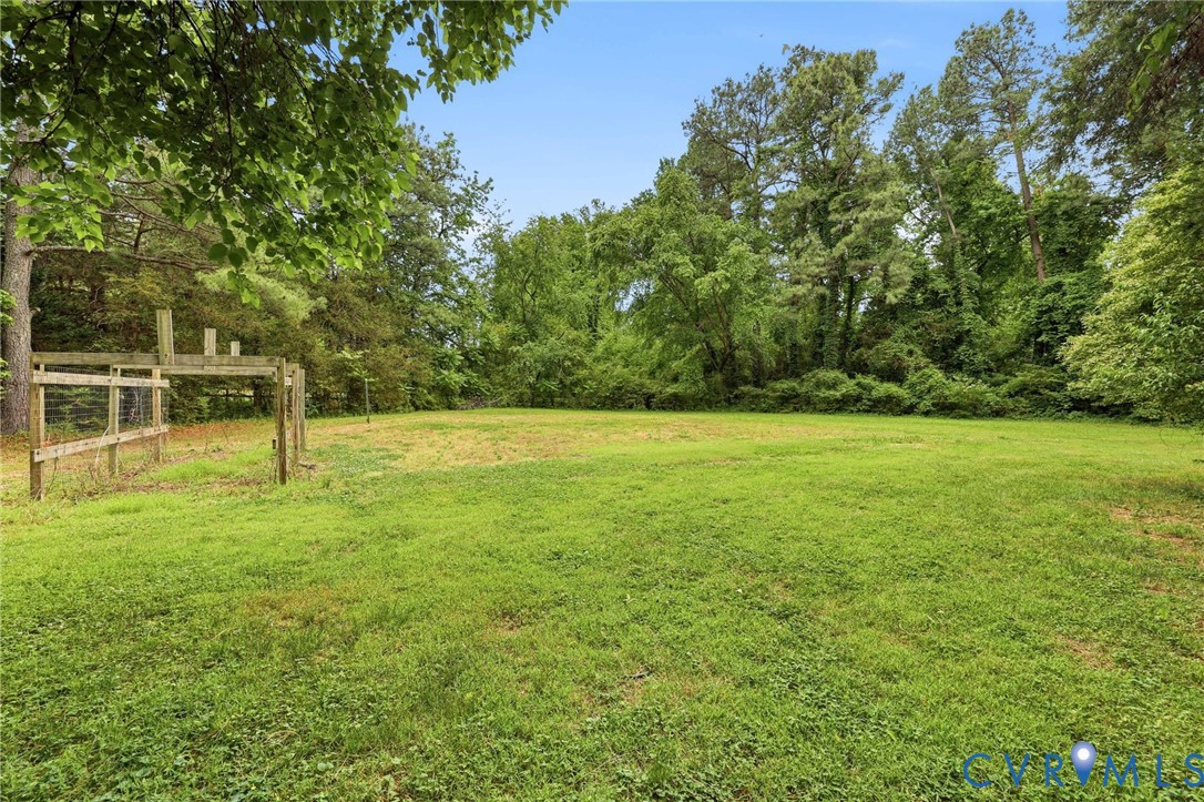 12111 Auger Lane Midlothian, VA 23113 - Photo 31 of 31 a view of a field with a tree