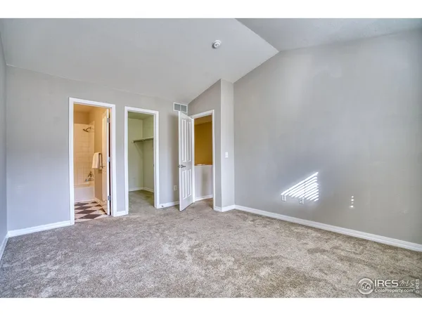 a view of an empty room with window