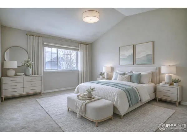 a bedroom with a bed a mirror and a window