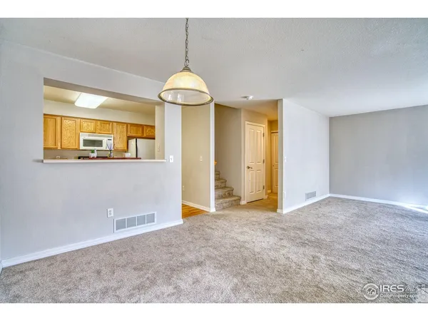 a view of empty room with a window