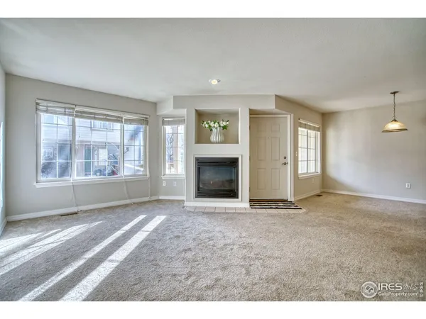 an empty room with windows