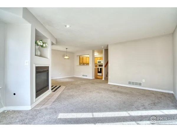 a view of a livingroom with a fireplace