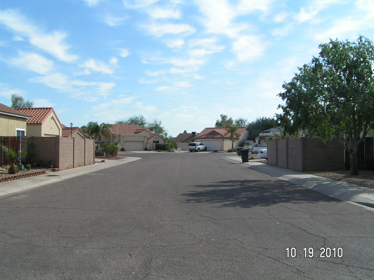 6009 West Shangri-la Road Glendale, AZ 85304 - Photo 2 of 10 a view of street with parked cars