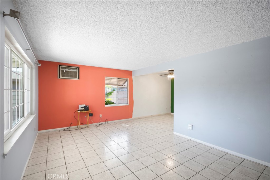 3825 Lofton Place Riverside, CA 92501 - Photo 3 of 20 an empty room with windows