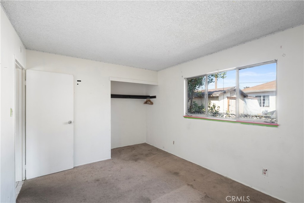 3825 Lofton Place Riverside, CA 92501 - Photo 9 of 20 a view of empty room with window