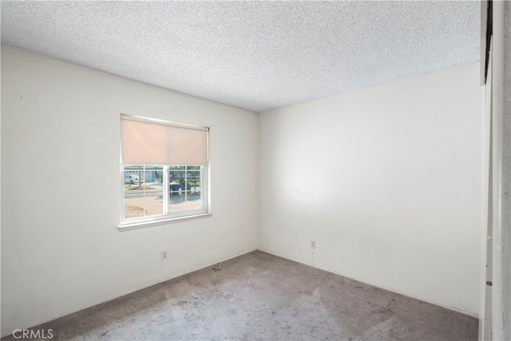 3825 Lofton Place Riverside, CA 92501 - Photo 10 of 20 an empty room with a window