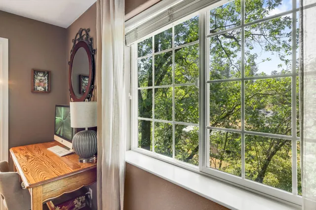 a backyard of a house with lots of green space