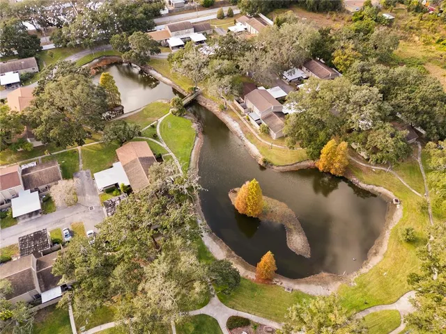 a view of a yard with cars
