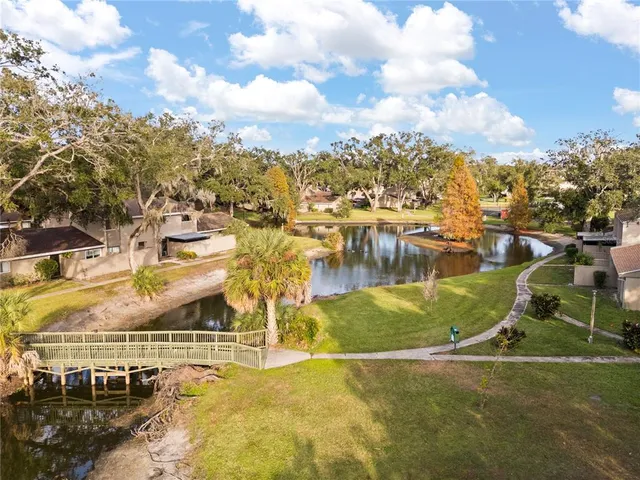 a front view of a house with a sitting area