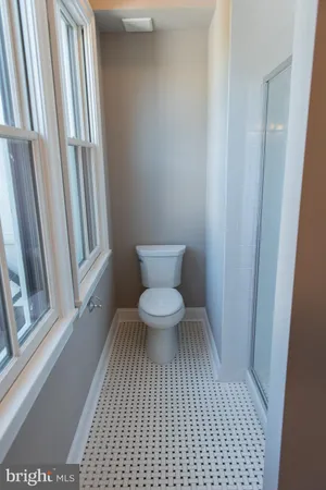 a bathroom with a toilet