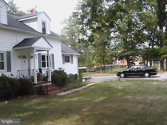 17107 Livingston Road Accokeek, MD 20607 - Photo 19 of 22 a view of a house with backyard and sitting area