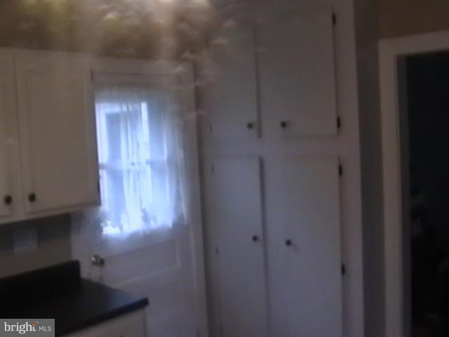 17107 Livingston Road Accokeek, MD 20607 - Photo 21 of 22 a bathroom with a sink and a mirror