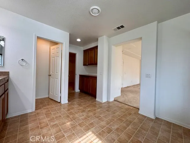 a view of livingroom with kitchen