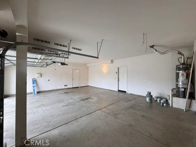 a front view of a house with yard and green space