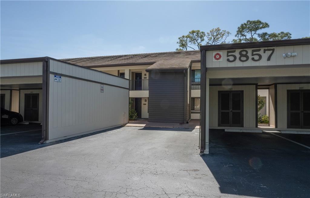 5857 Rattlesnake Hamm Road, Unit 204 Naples, FL 34113 - Photo 15 of 15 a view of an entrance of the building