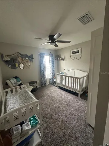 a view of a livingroom with furniture