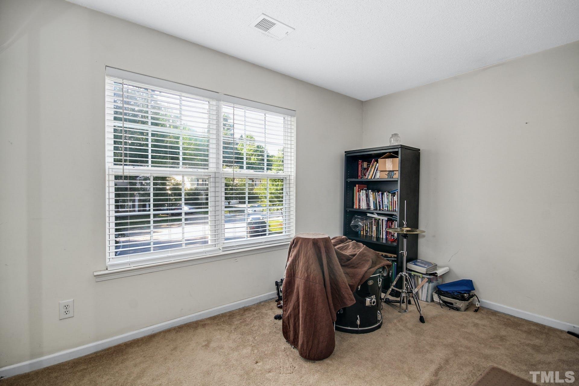 5925 Wessel Way Raleigh, NC 27610 - Photo 20 of 29 a view of a livingroom with furniture and a window