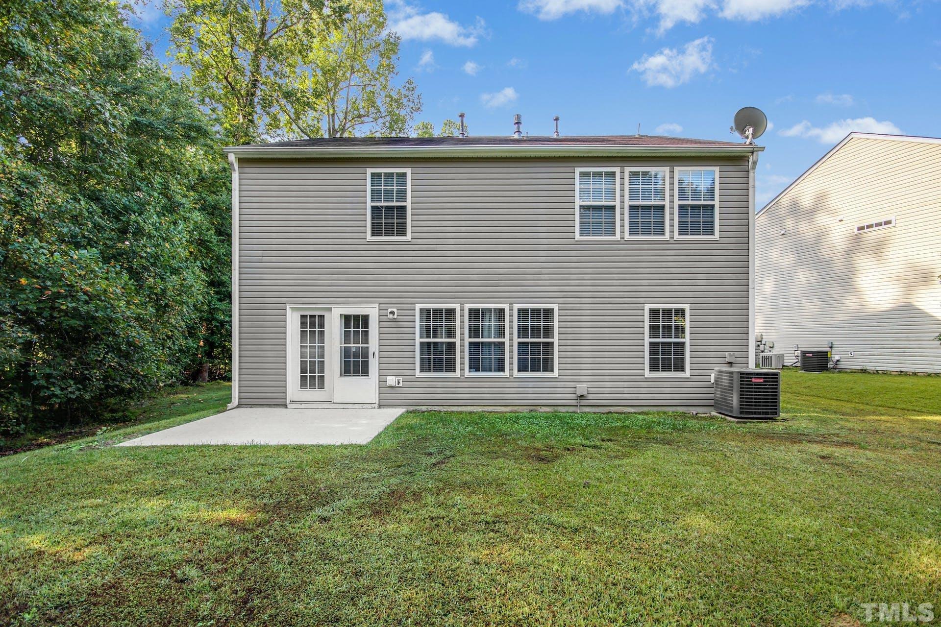5925 Wessel Way Raleigh, NC 27610 - Photo 25 of 29 a house view with a garden space