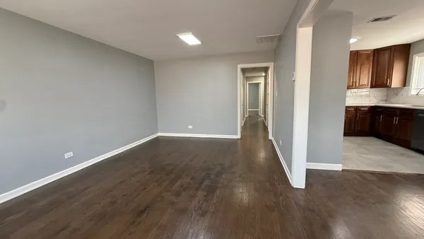 a view of entryway with wooden floor