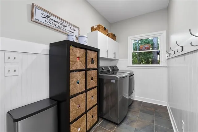 a kitchen with stainless steel appliances granite countertop a refrigerator and a stove