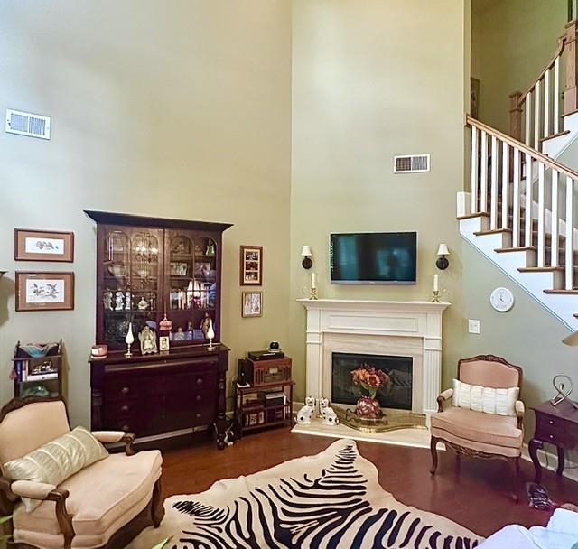104 Willow Overlook Canton, GA 30115 - Photo 12 of 27 a living room with furniture and a fireplace