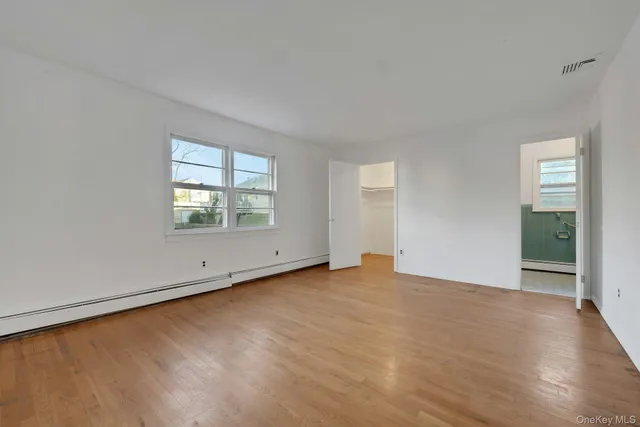 an empty room with window