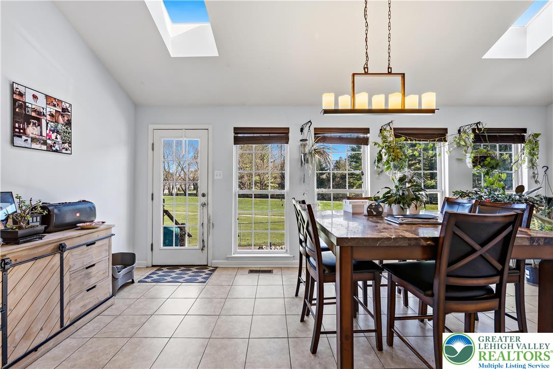 130 Lower Way Road Easton, PA 18045 - Photo 13 of 56 a view of a dining room with furniture window and outside view