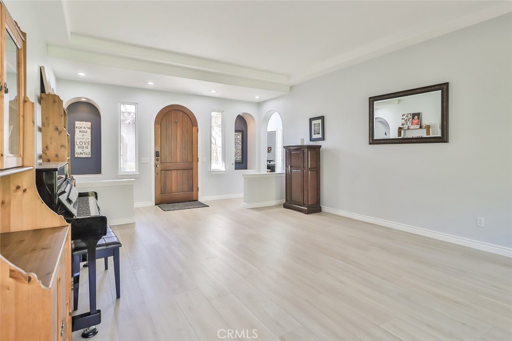 5421 Moonshadow Street Simi Valley, CA 93063 - Photo 11 of 56 a view of hall way with furniture and floor to ceiling window
