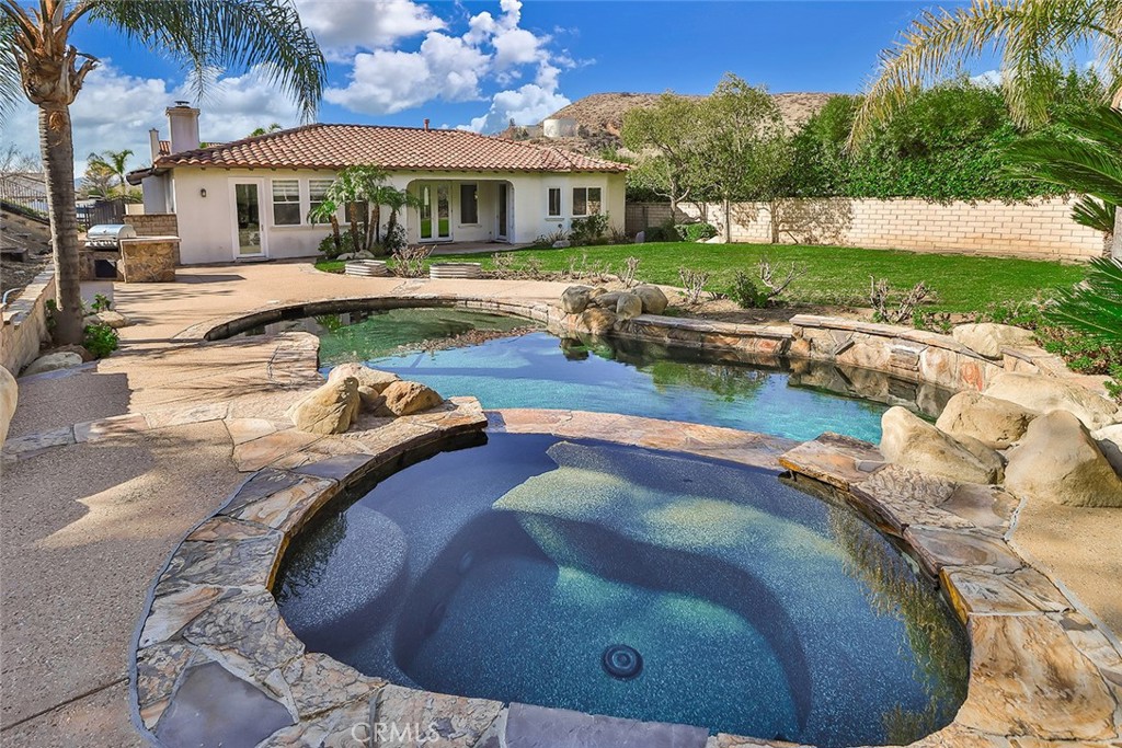5421 Moonshadow Street Simi Valley, CA 93063 - Photo 55 of 56 a view of a house with swimming pool