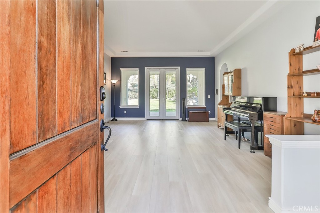 5421 Moonshadow Street Simi Valley, CA 93063 - Photo 8 of 56 a view of a living room and hardwood floor