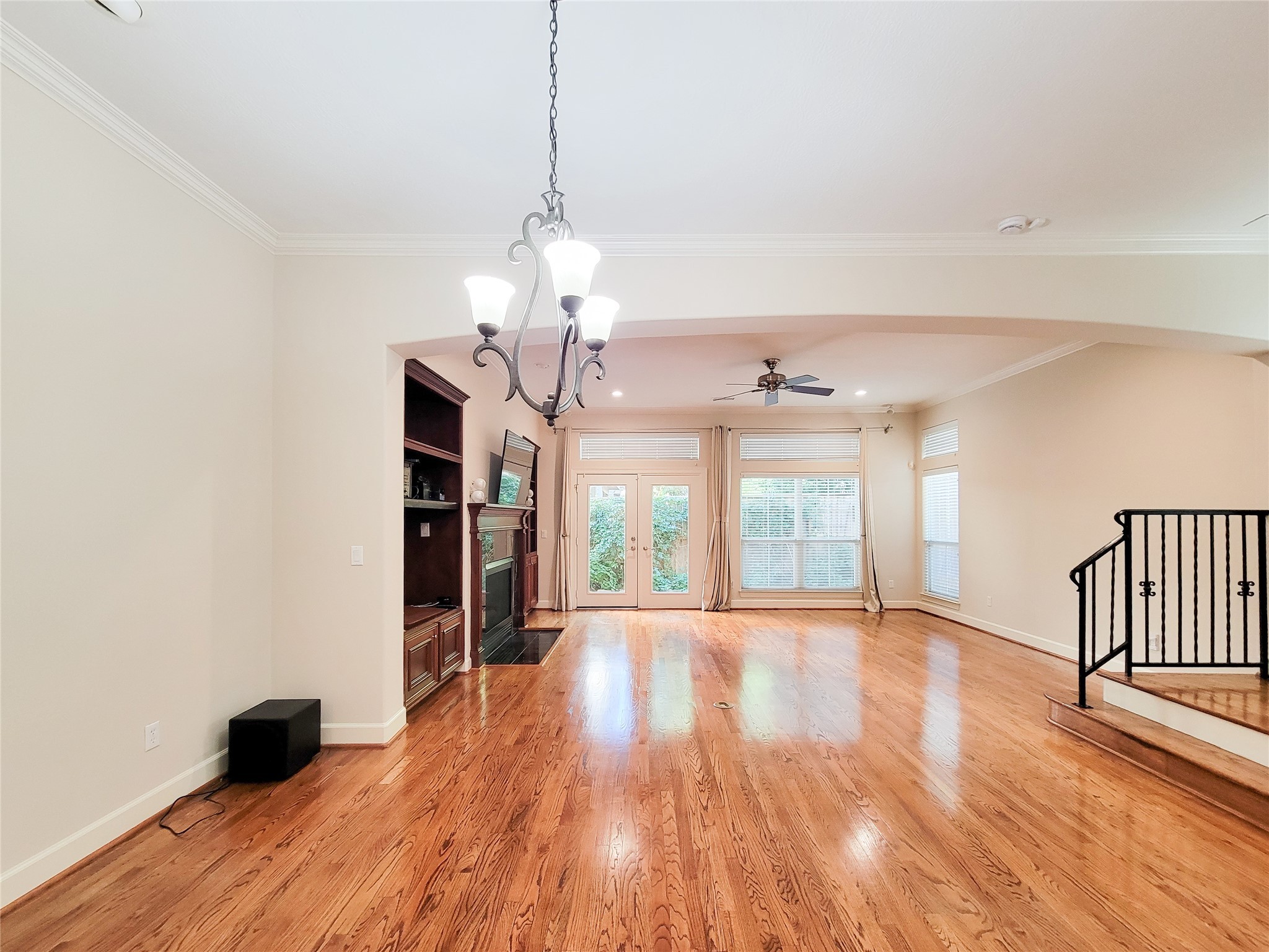 5514 Feagan Street Houston, TX 77007 - Photo 11 of 48 a view of a room with wooden floor chandelier and windows