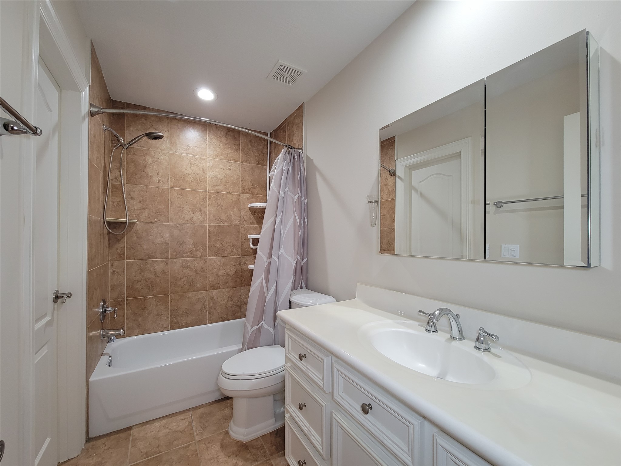 5514 Feagan Street Houston, TX 77007 - Photo 26 of 48 a bathroom with a granite countertop sink toilet and shower
