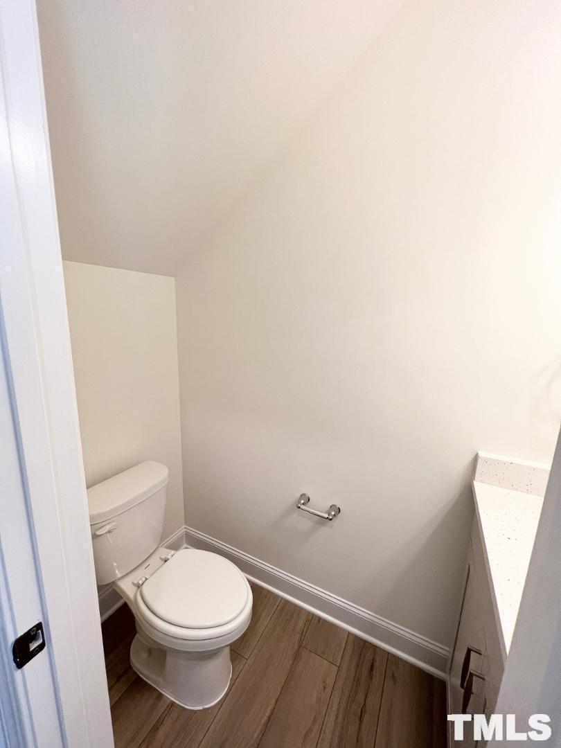 324 Highview Drive Benson, NC 27504 - Photo 3 of 12 a white toilet sitting next to a shower