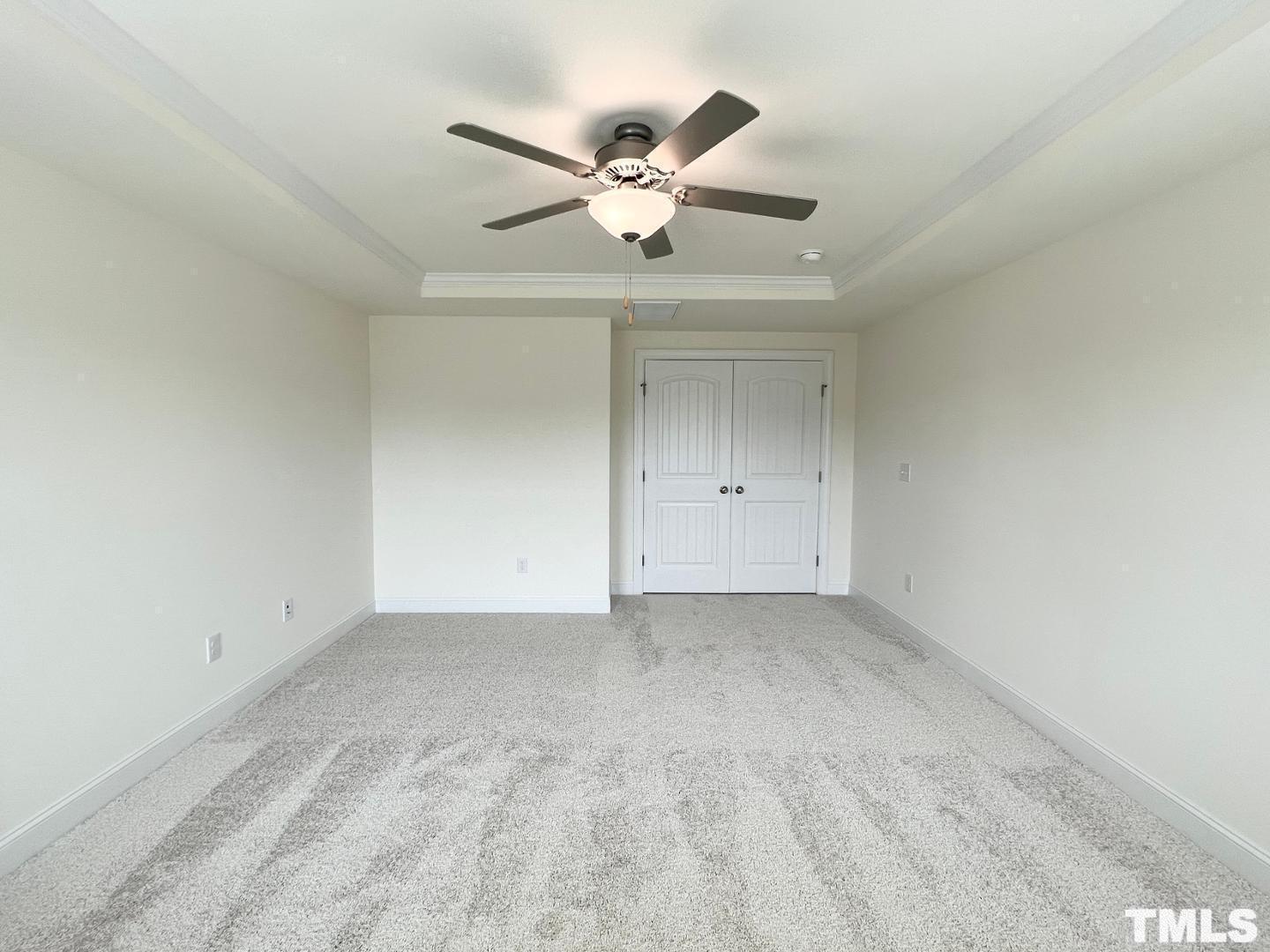 324 Highview Drive Benson, NC 27504 - Photo 7 of 12 a view of an empty room with a ceiling fan