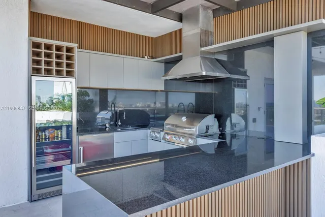 a balcony with furniture and city view