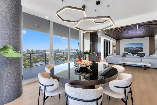 a kitchen with granite countertop a sink and stainless steel appliances