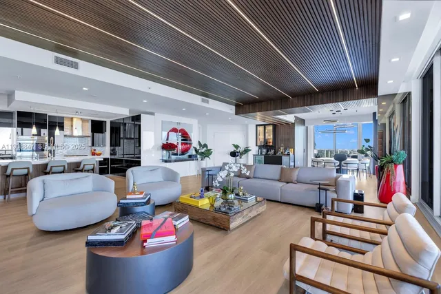 a bathroom with a sink a vanity and a shower