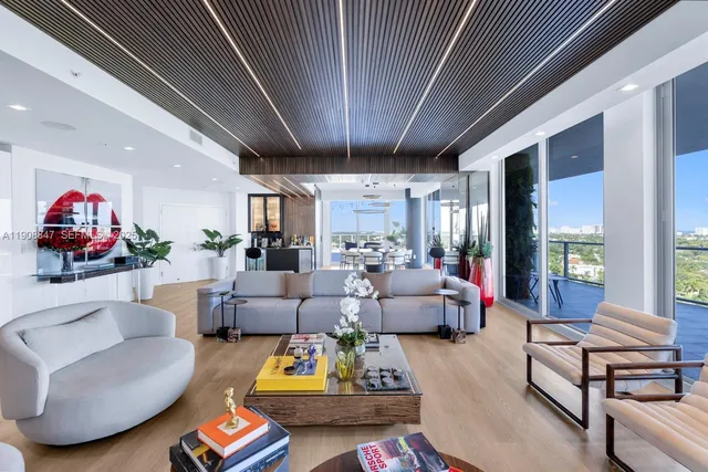 a bed room with a bed mirror and a window